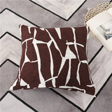 Housse de coussin bi extensible marron seule