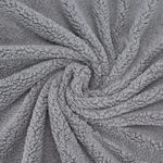 Tissu polaire de notre plaid gris pour canape