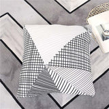 Housse coussin gris et blanc