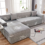 Housse de canape angle bi extensible gris vue de coté