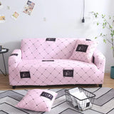 Housse de canape extensible rose motifs