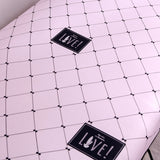 Motifs de notre housse de canape extensible rose