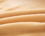 Textile doux de notre housse de canape d'angle en velours beige