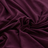 Textile elastique pour housse d'assise de canape d'angle prune
