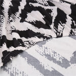 Coutures de notre housse de canape motifs noir et blanc