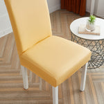 Housse de chaise imitation cuir jaune