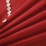 Textile extensible de la housse de coussin fleurie rouge