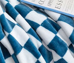 Tissu doux de notre plaid cocooning bleu