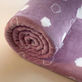 Tissu doux de notre plaid polaire rose pour canapé