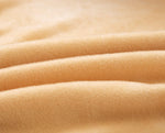 Textile doux de notre housse de canape d'angle en velours beige