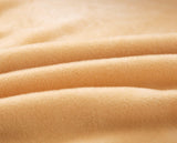 Textile doux de notre housse de canape d'angle en velours beige
