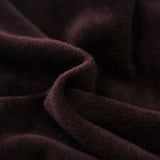 Textile doux de notre housse de canape d'angle en velours marron chocolat