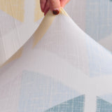Textile elastique pour housse de canape geometrique