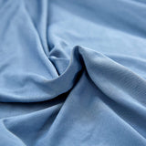 Textile extensible de notre housse de coussin bleu ciel