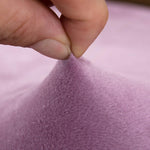 Textile extensible de notre housse de coussin velours mauve