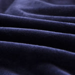 Tissu elastique et doux de notre housse de canape velours bleu marine