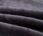 Tissu elastique et doux de notre housse de canape en velours gris anthracite