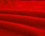 Tissu elastique et doux de notre housse de canape en velours rouge