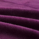 Tissu elastique et doux de notre housse de canape velours violet